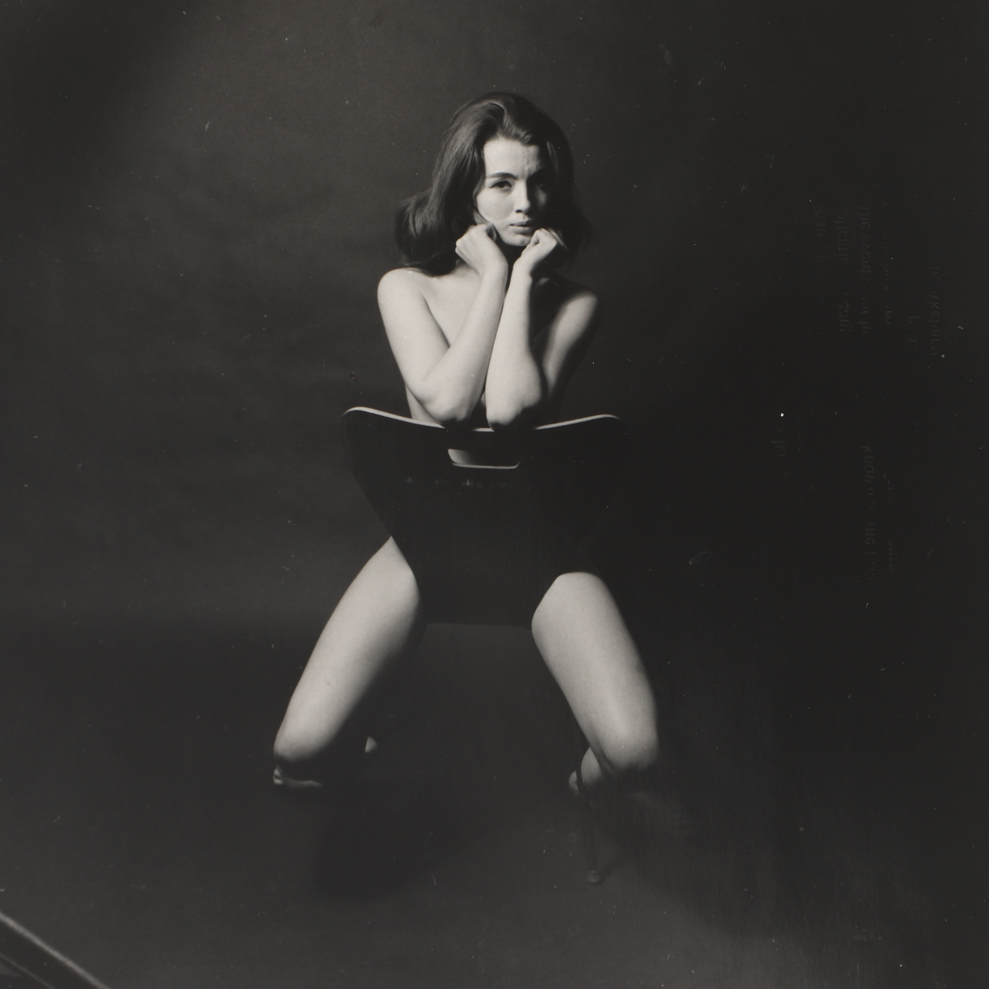 Lewis Morley (1925-2013) 1963, a photograph of a naked Christine Keeler, sitting astride an Arne Jacobsen-style chair (now in the V&A Museum) (£500-800)